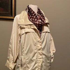 ZENERGY Chico’s pale yellow windbreaker jacket. Chico’s size 3, US. XL